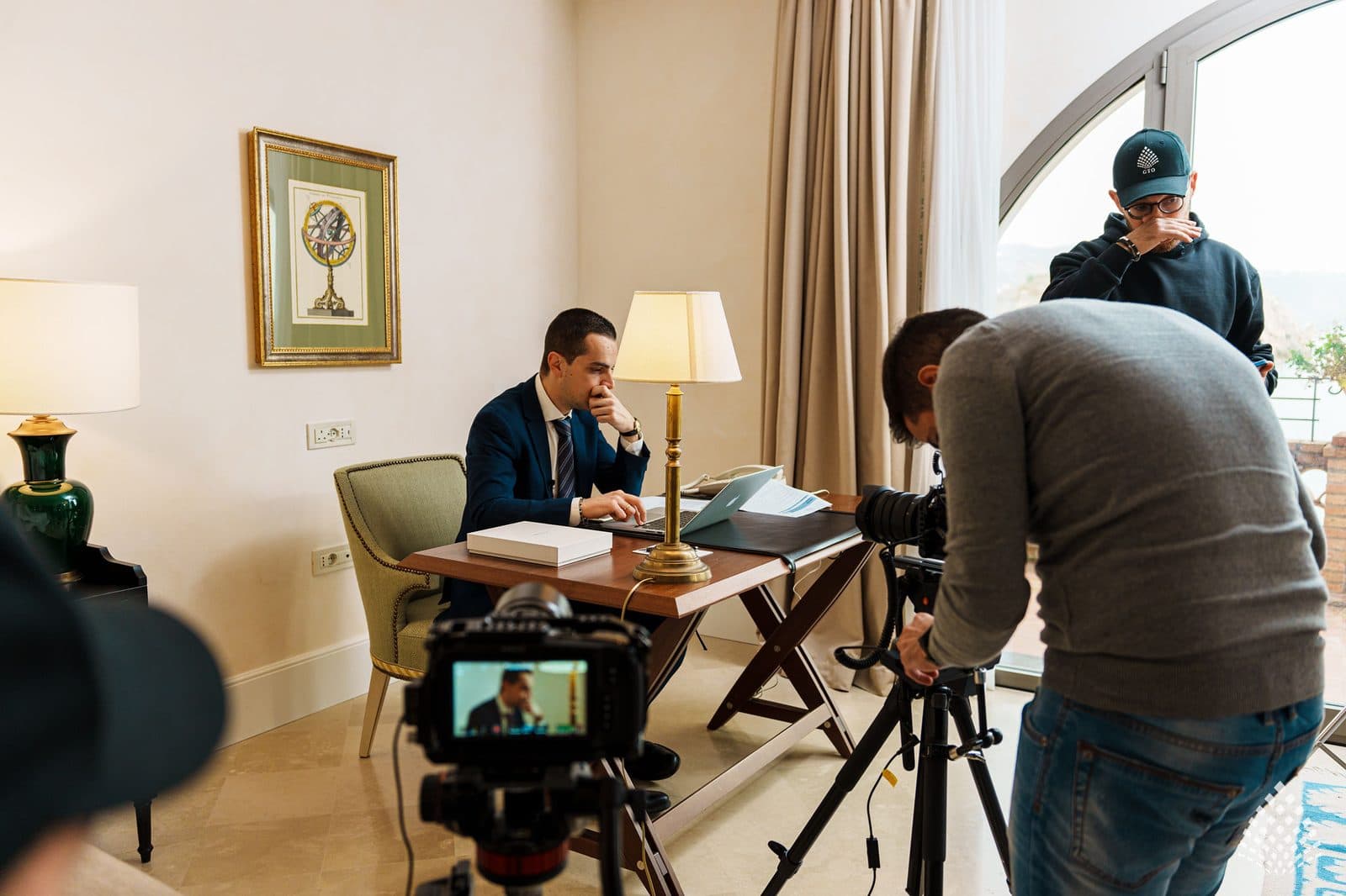 A desk sequence being filmed in a guest suite at Villa Sant'Andrea