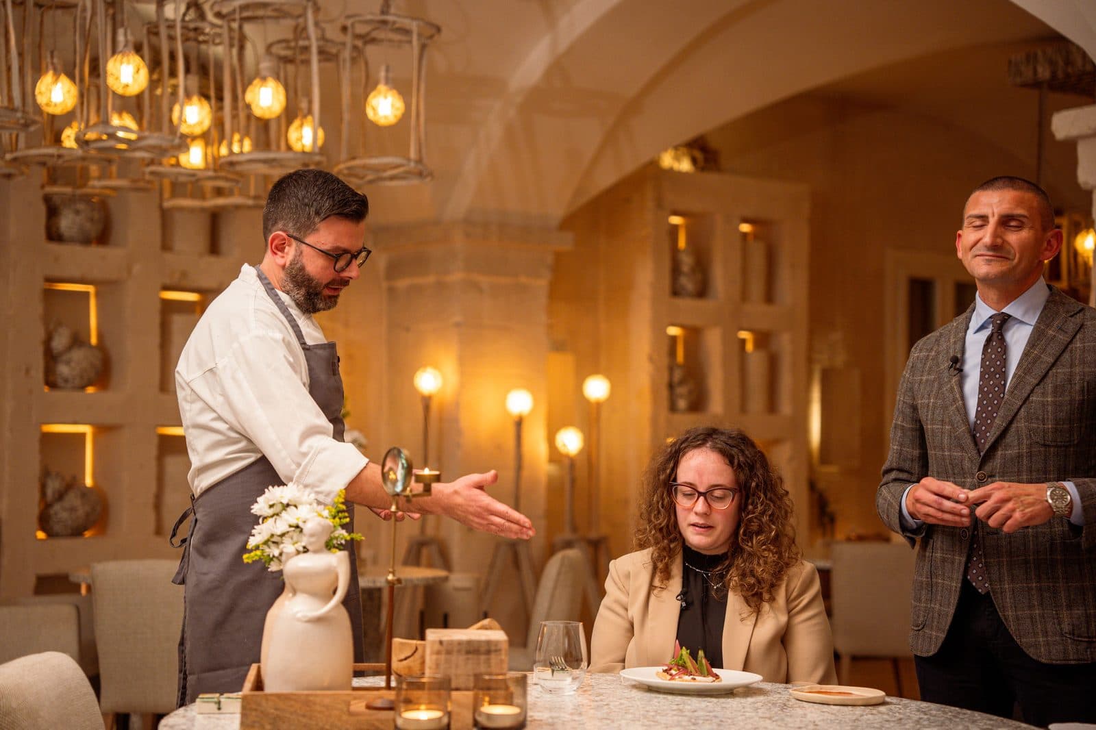 A dish being presented to guests at Borgo Egnazia