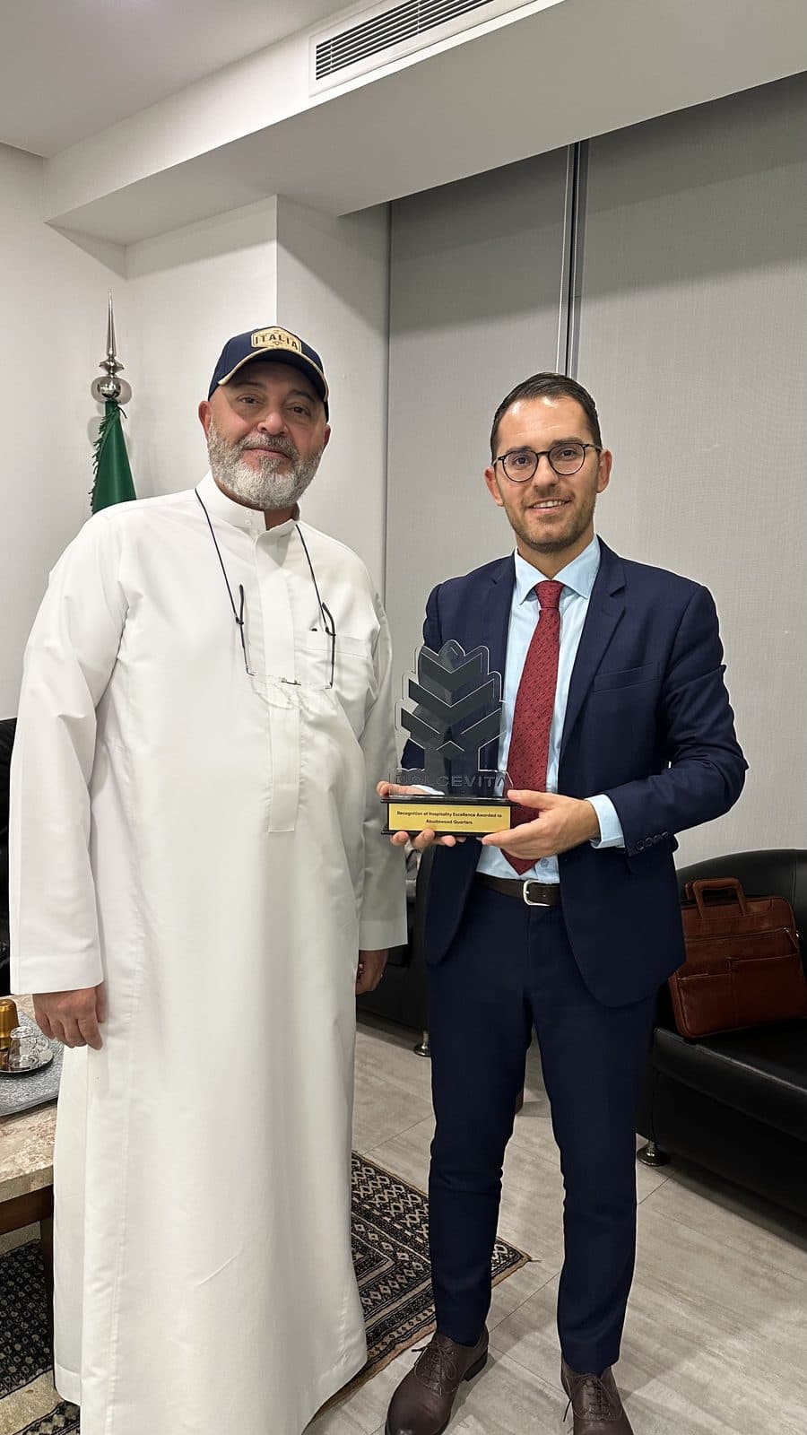 Kledis Brahimi with the DolceVita recognition plaque awarded to MOQAM.